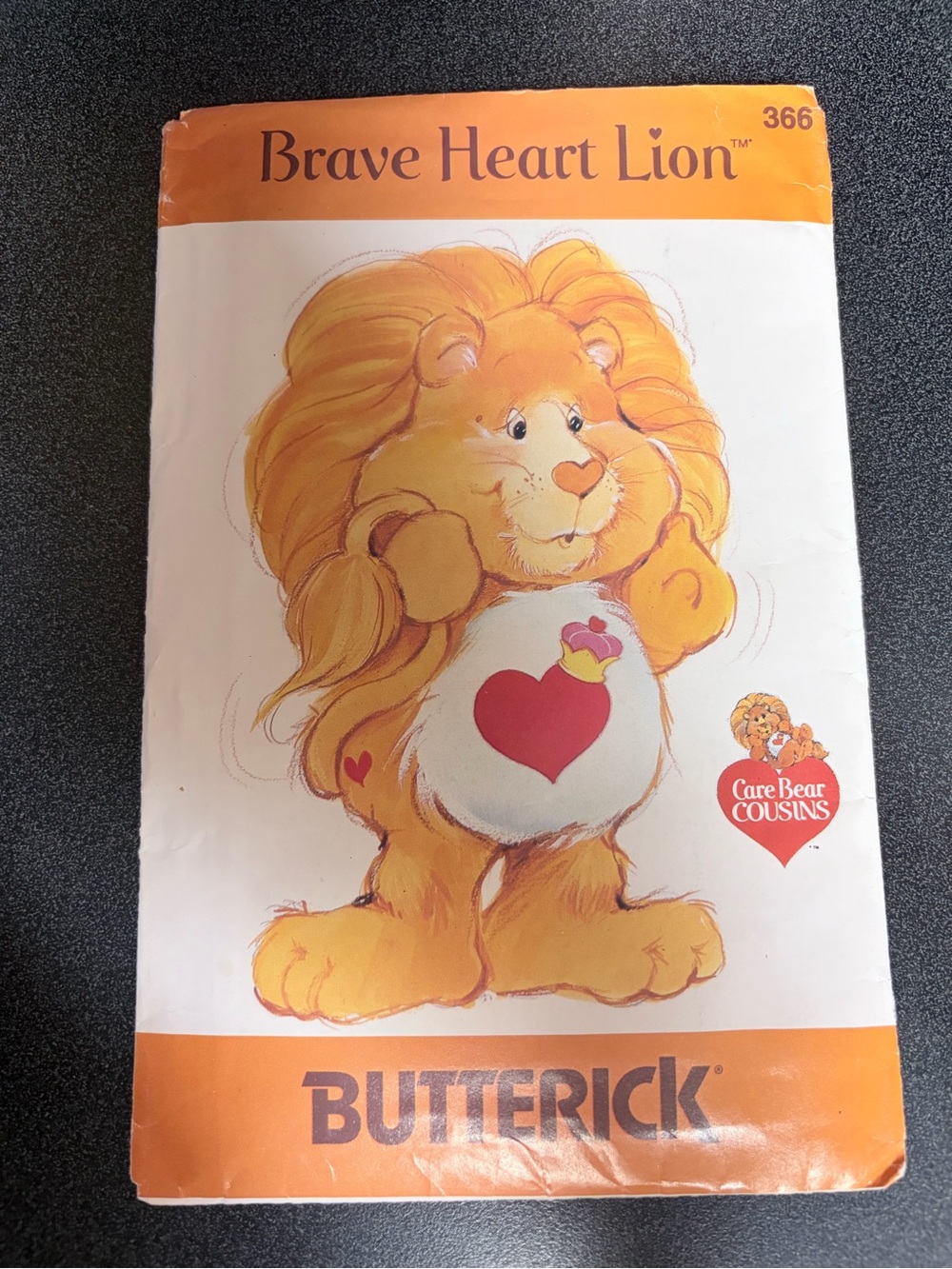 Butterick Care Bear cousins Brave Heart Lion Plush Pattern - Orange, White, Red